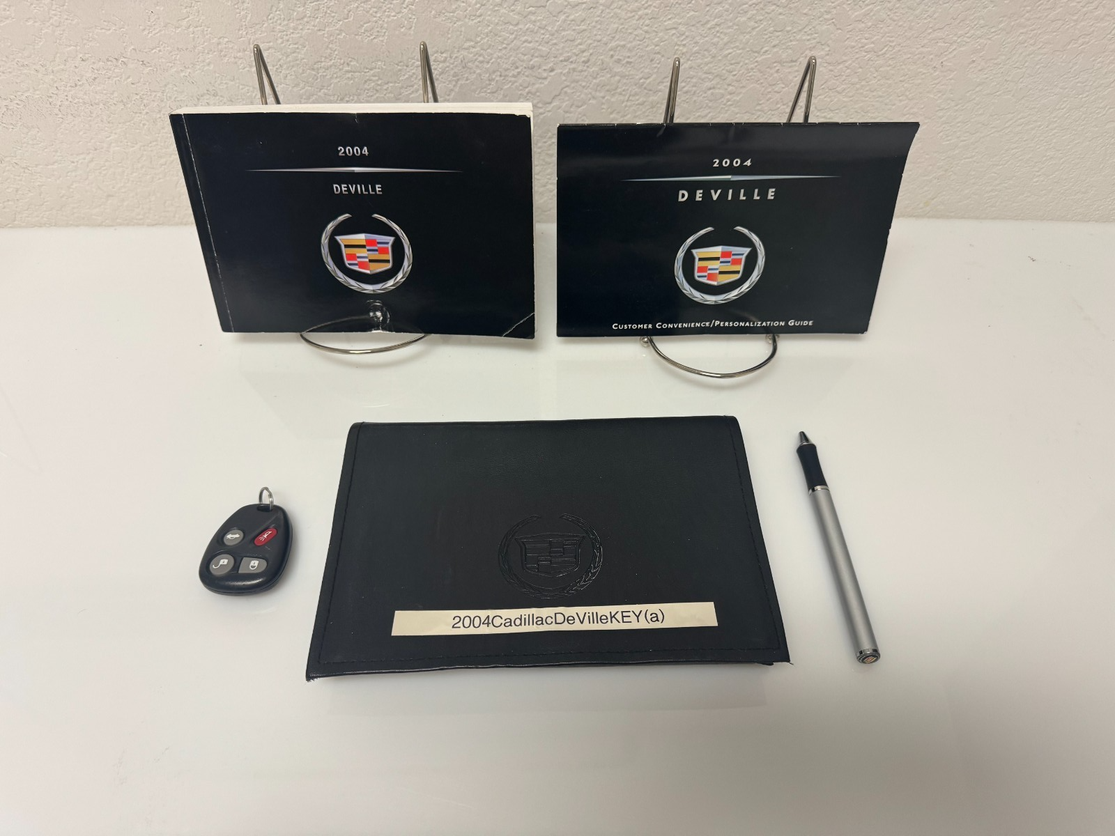 2004 Cadillac DeVille Genuine Factory Owner's Manual Set w/Bonus Key Fob & Pen
