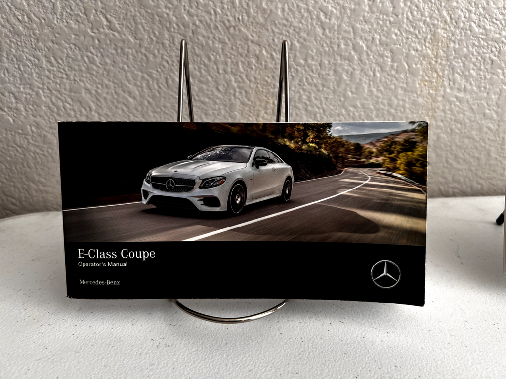 2018 Mercedes-Benz E-Class Coupe Owner's Manual Set w/ supplements and case.