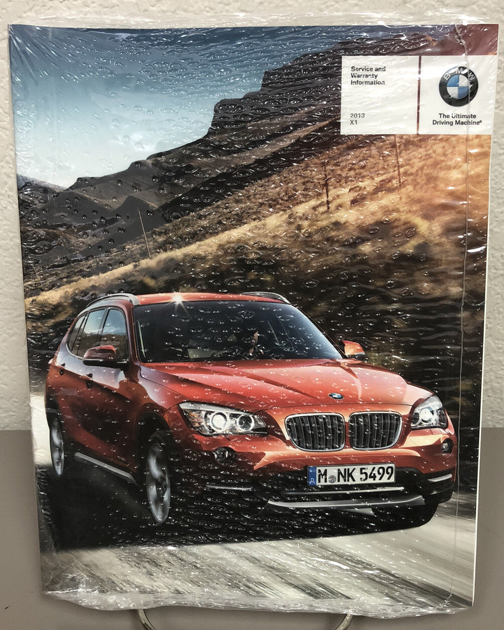 2013 BMW X1 Genuine OEM Owner's Manual Set with iDrive/Navigation and BMW Case