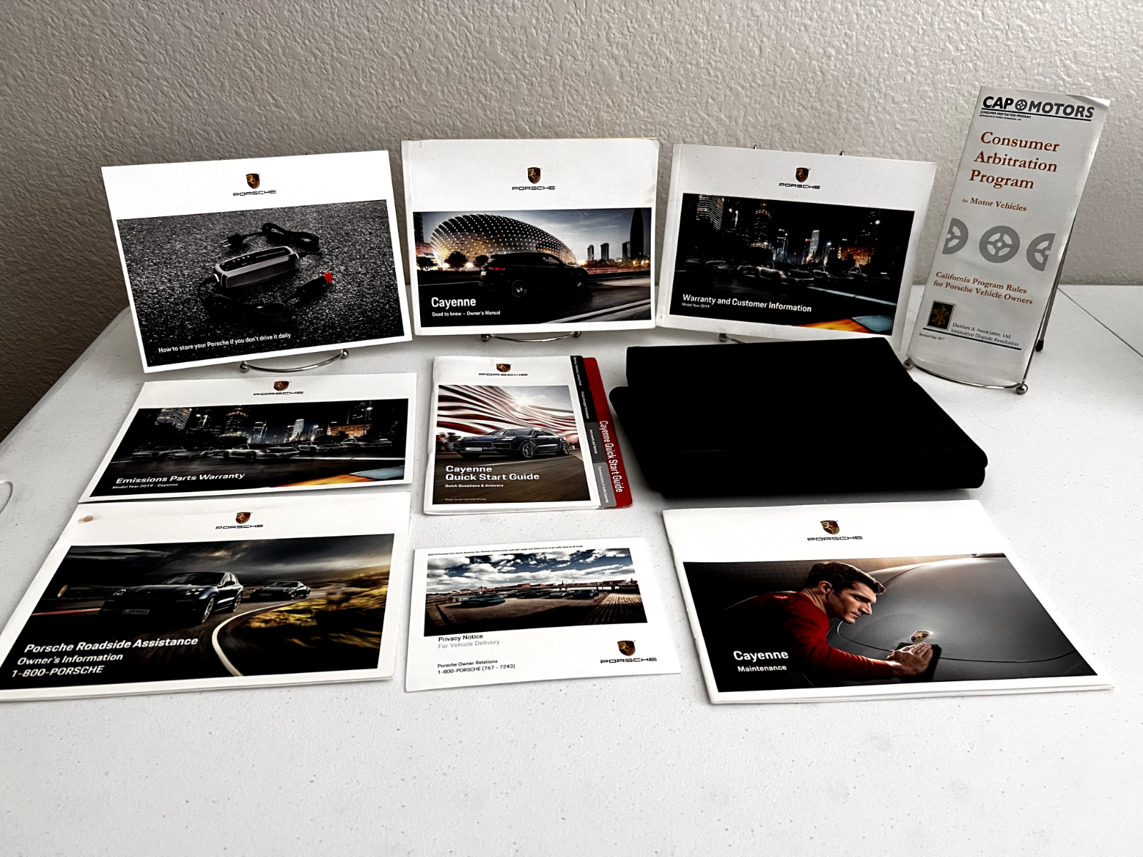 2019 Porsche Cayenne OEM Owner's Manual w/ several supplementals and logo case.