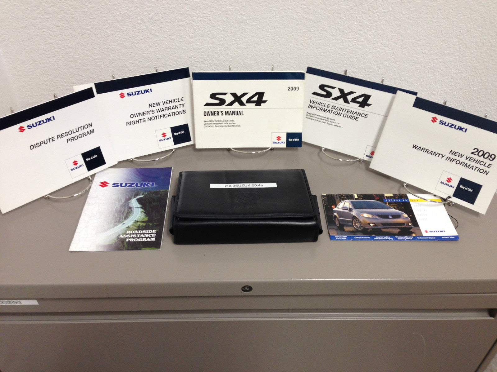 2009 Suzuki SX4 OEM Owner's Manual w/ Supplements & Case - Free Shipping