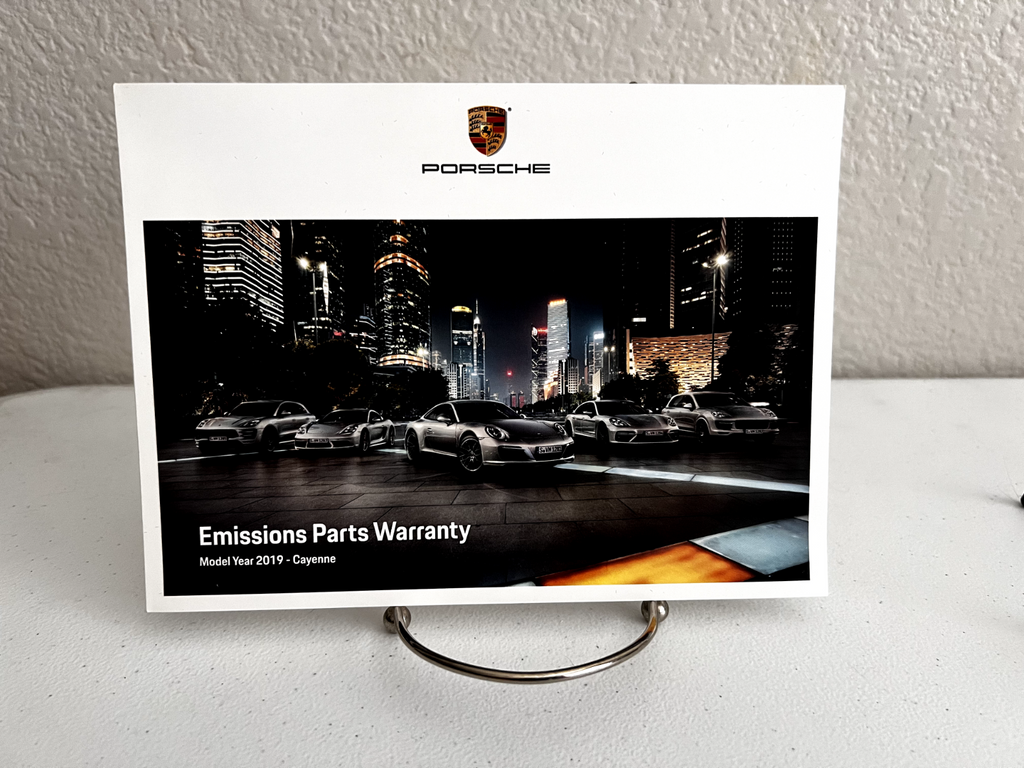 2019 Porsche Cayenne OEM Owner's Manual w/ several supplementals and logo case.